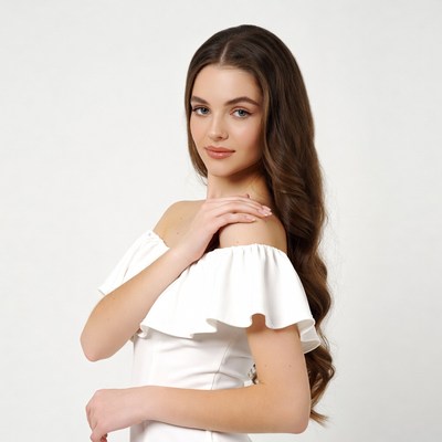 Woman in white off-shoulder dress