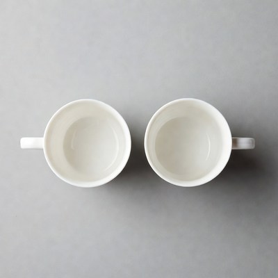 Two white empty mugs