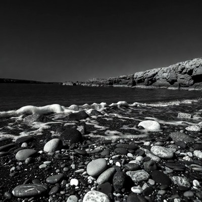 Black and White Pebble Beach Waves