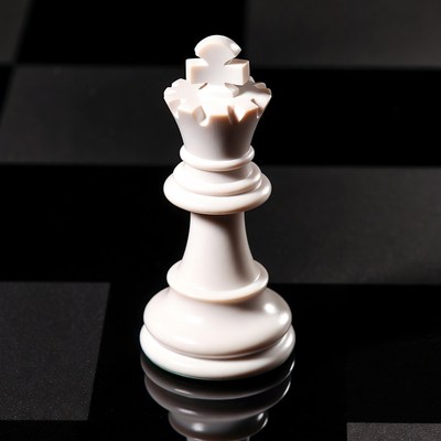 White Queen Chess Piece on Board