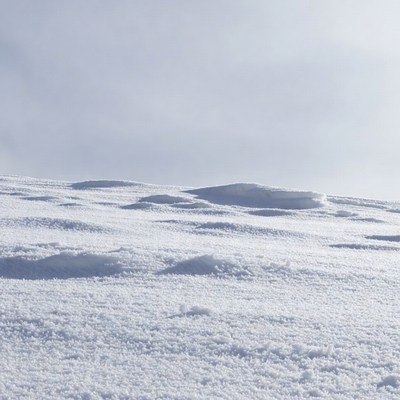 Snowy Landscape with Rolling Hills