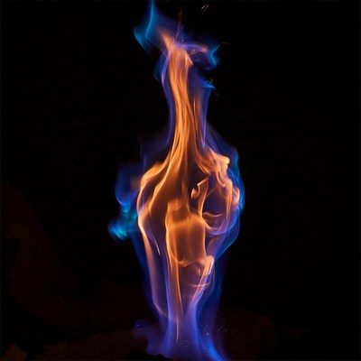 Vibrant blue orange flames on black