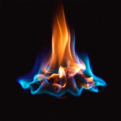 Vibrant orange blue flames on black