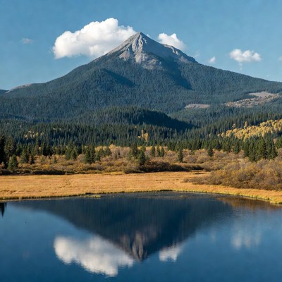 Mountain reflected in alpine lake