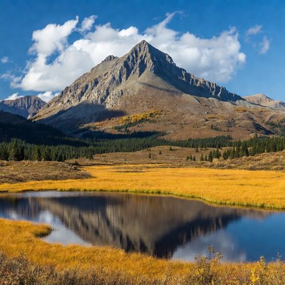 Mountain Peak Reflecting in Autumn Pond