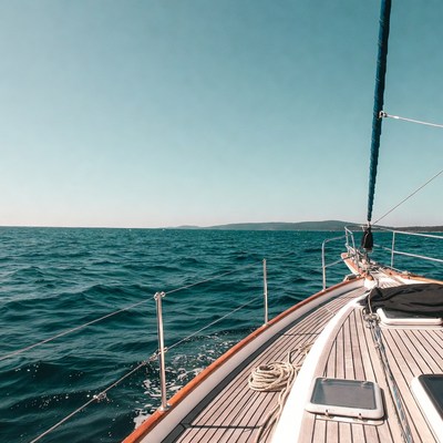 Sailboat Sailing on Blue Ocean