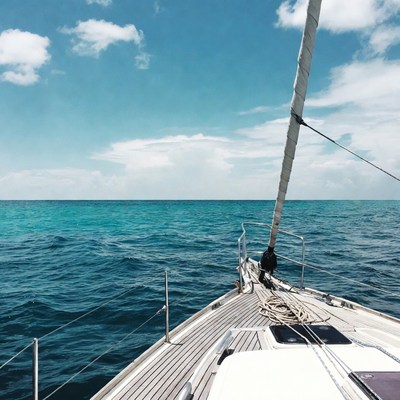 Sailboat on turquoise ocean