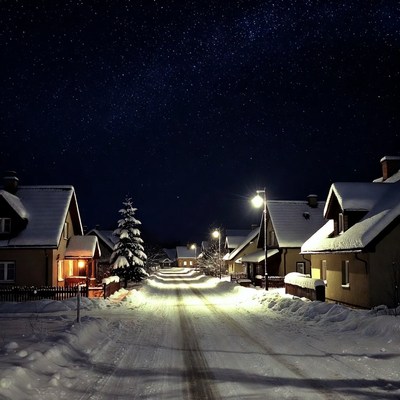 Snowy Village Street Under Starry Night Sky