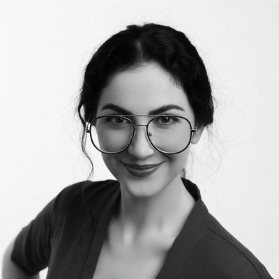 Woman with glasses smiling