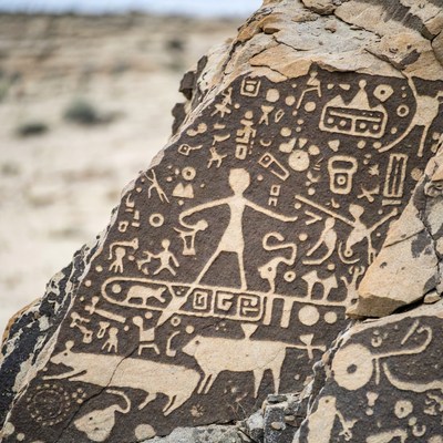 Ancient Petroglyphs on Desert Rock