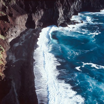 Black Sand Beach with Ocean Waves