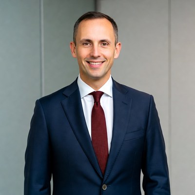 Smiling man in navy suit