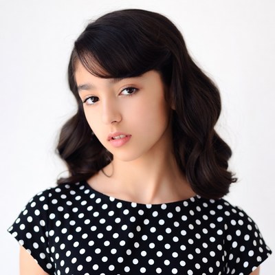 Asian girl in polka dot dress
