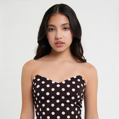 Asian girl in polka dot tube top