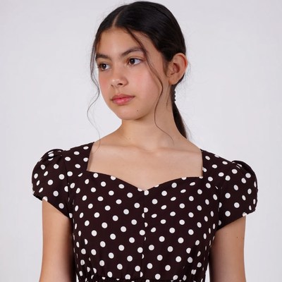 Girl in polka dot dress