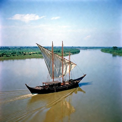 Traditional sailboat on river