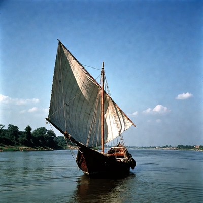 Traditional sailboat on river