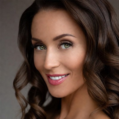 Beautiful woman with green eyes smiling