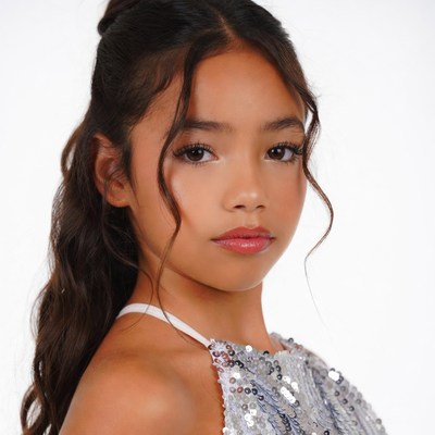 Asian girl in sequin top