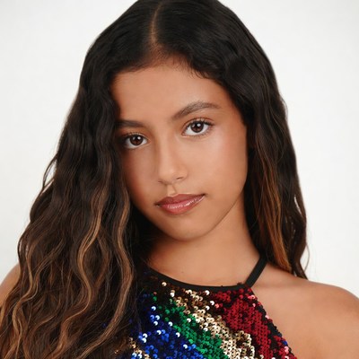 Teen girl in colorful sequin dress