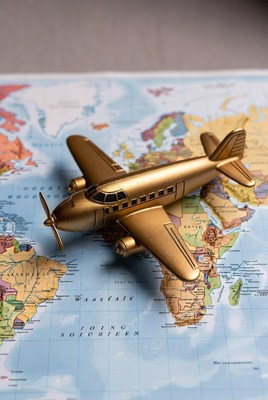 Golden Airplane Model on World Map