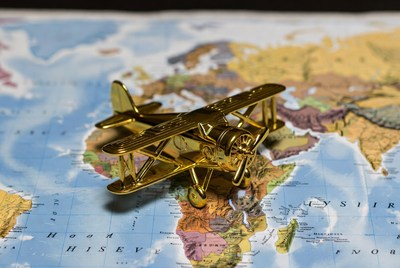Golden Airplane Model on World Map