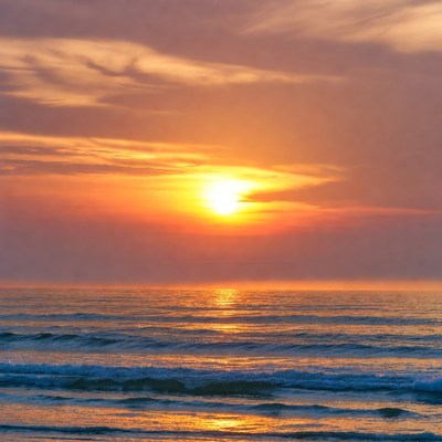 Sunset over ocean waves