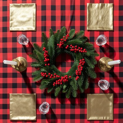 Christmas wreath on plaid table