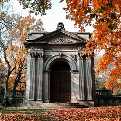 Neoclassical Mausoleum in Autumn Forest