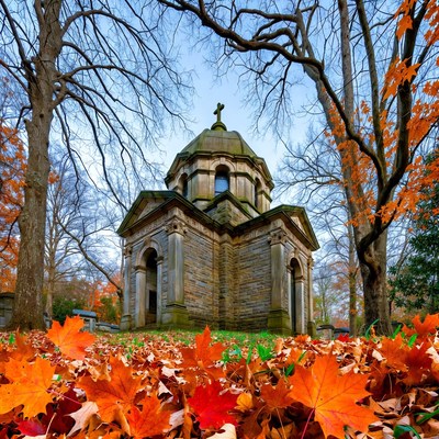 Stone Chapel in Autumn Forest