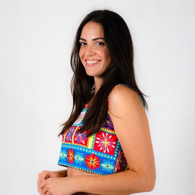 Smiling woman in colorful crop top