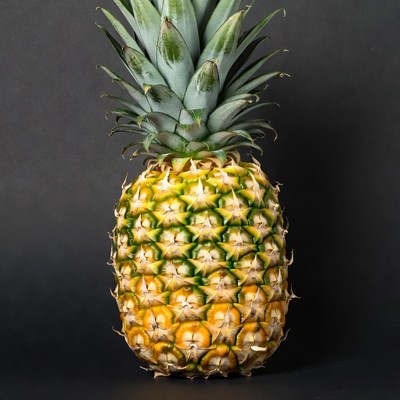 Fresh Pineapple on Black Background