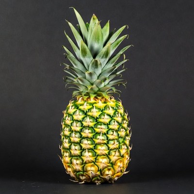 Fresh Pineapple on Black Background
