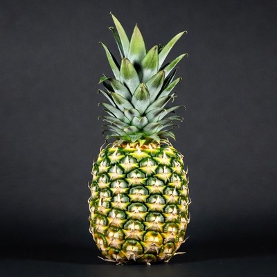Fresh Pineapple on Black Background