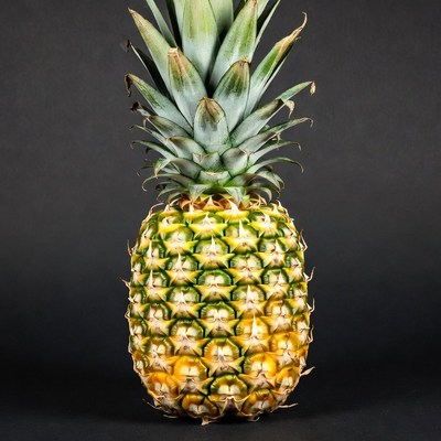 Fresh Pineapple on Black Background