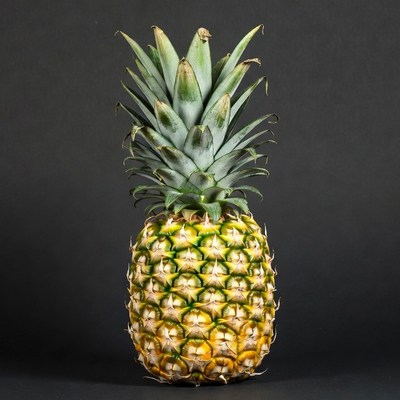 Pineapple on black background