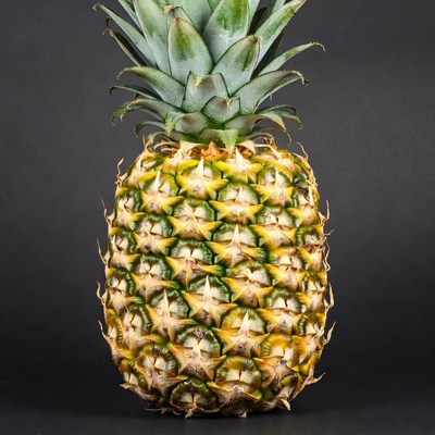 Fresh Pineapple on Black Background