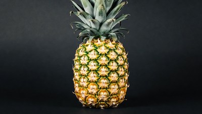 Fresh Pineapple on Black Background