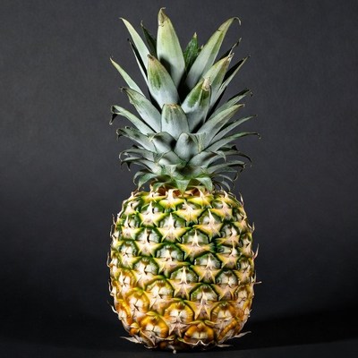 Fresh Pineapple on Black Background