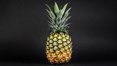 Fresh Pineapple on Black Background