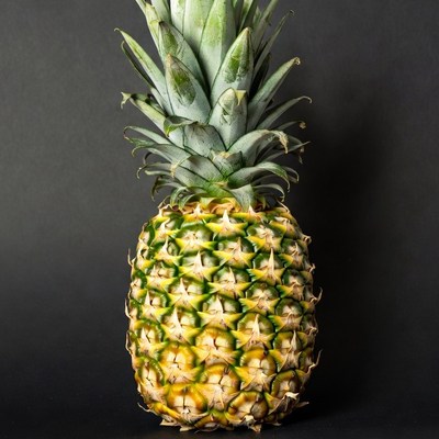 Pineapple on black background