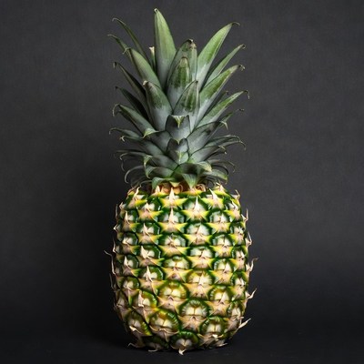 Fresh Pineapple on Black Background