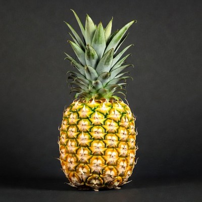 Fresh Pineapple on Black Background