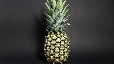 Fresh Pineapple on Black Background