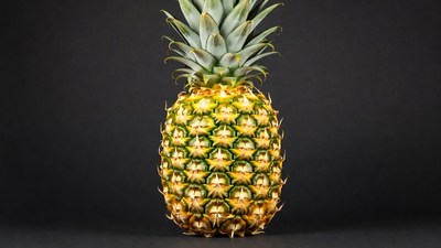 Fresh Pineapple on Black Background