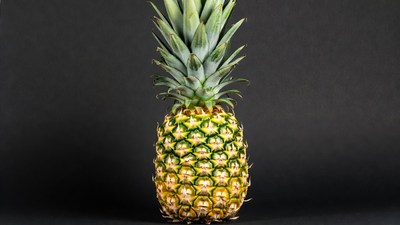 Fresh Pineapple on Black Background