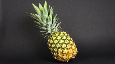 Fresh Pineapple on Black Background