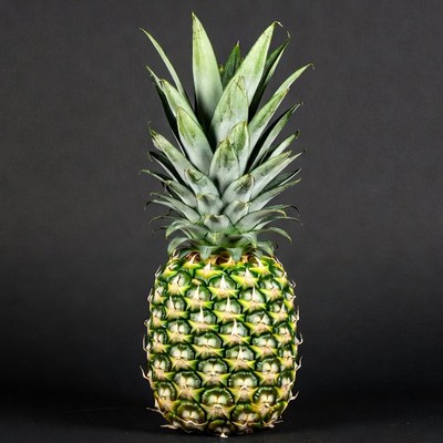 Fresh Pineapple on Black Background