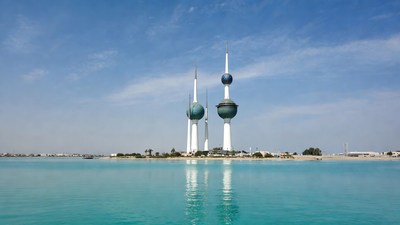 Kuwait Towers over turquoise water