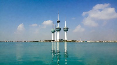 Kuwait Towers reflecting in water